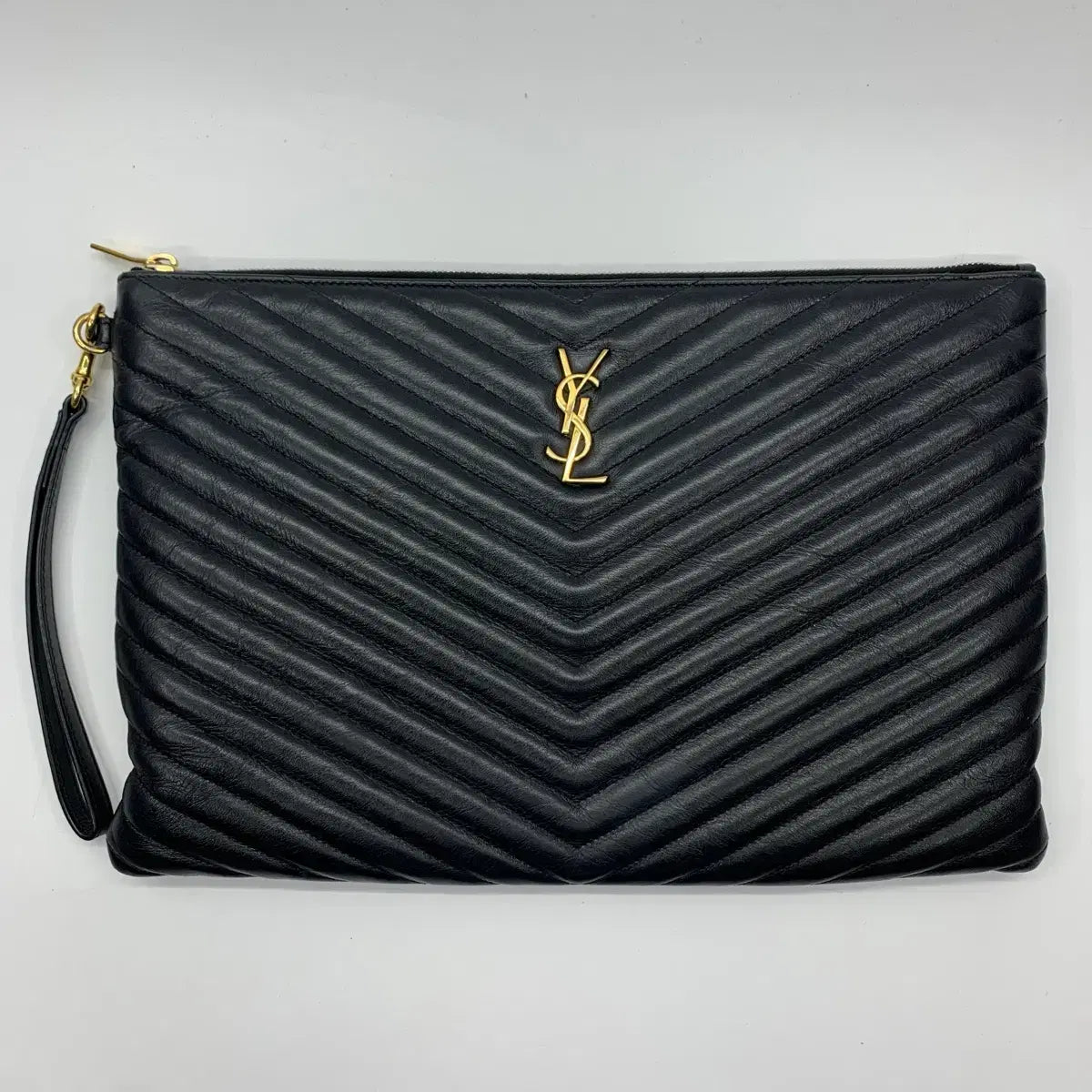 SAINT LAURENT Monogram Matelassé Strap Clutch Bag in Black