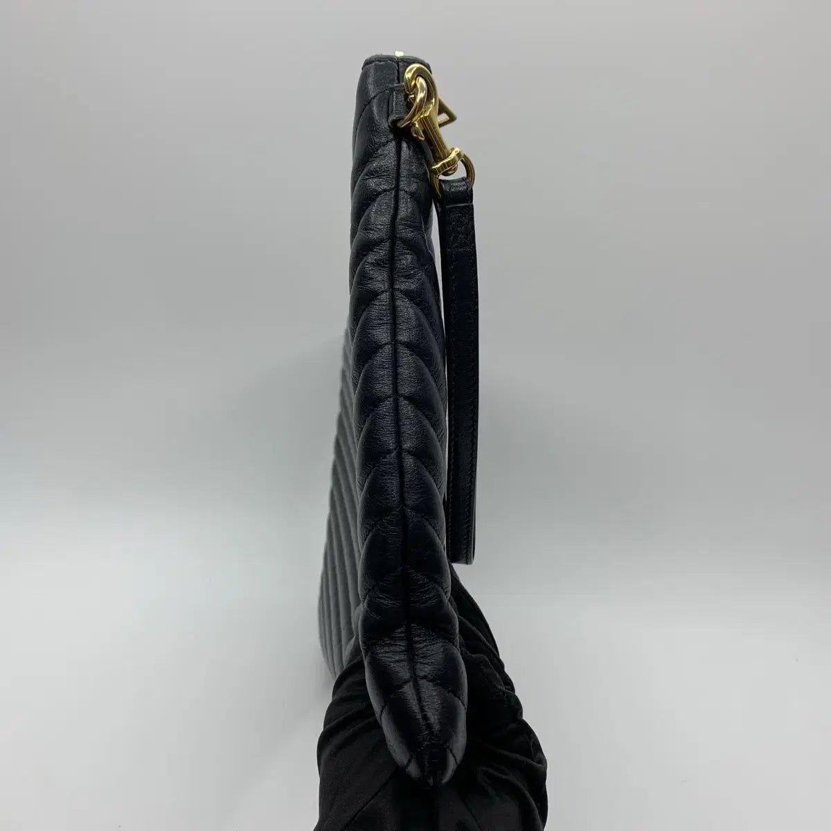 SAINT LAURENT Monogram Matelassé Strap Clutch Bag in Black